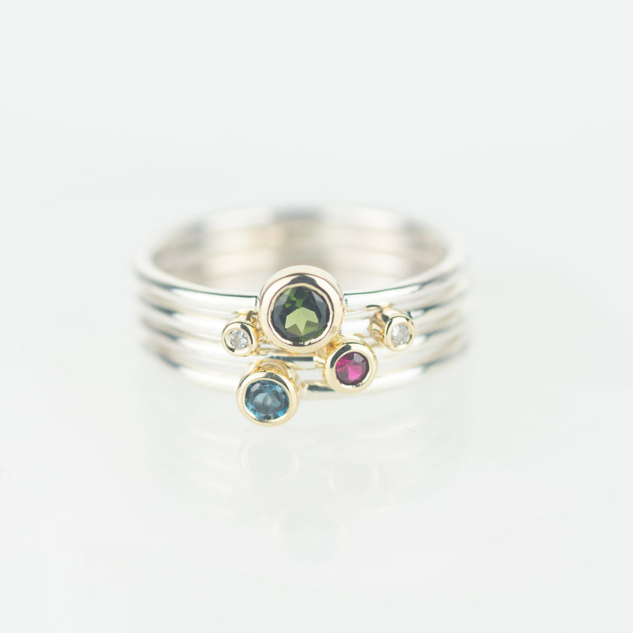 Draco - Green Tourmaline, Ruby, London Blue Topaz and Diamond Silver and Gold Stacking Ring Set