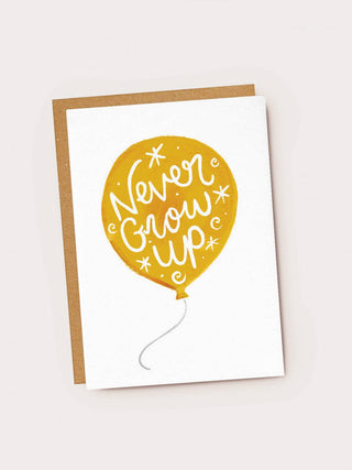 'Never Grow Up' Yellow Balloon Birthday Card