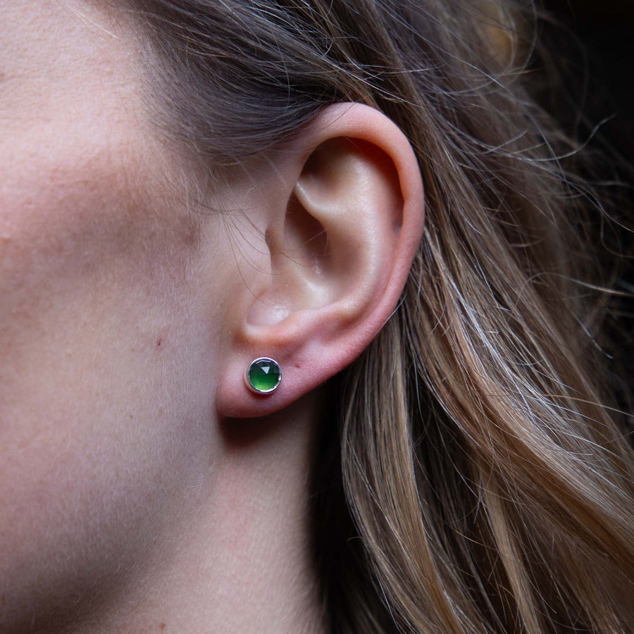 Modelled image of the green rose cut round serpentine studs. Handmade in recycled solid sterling silver. 